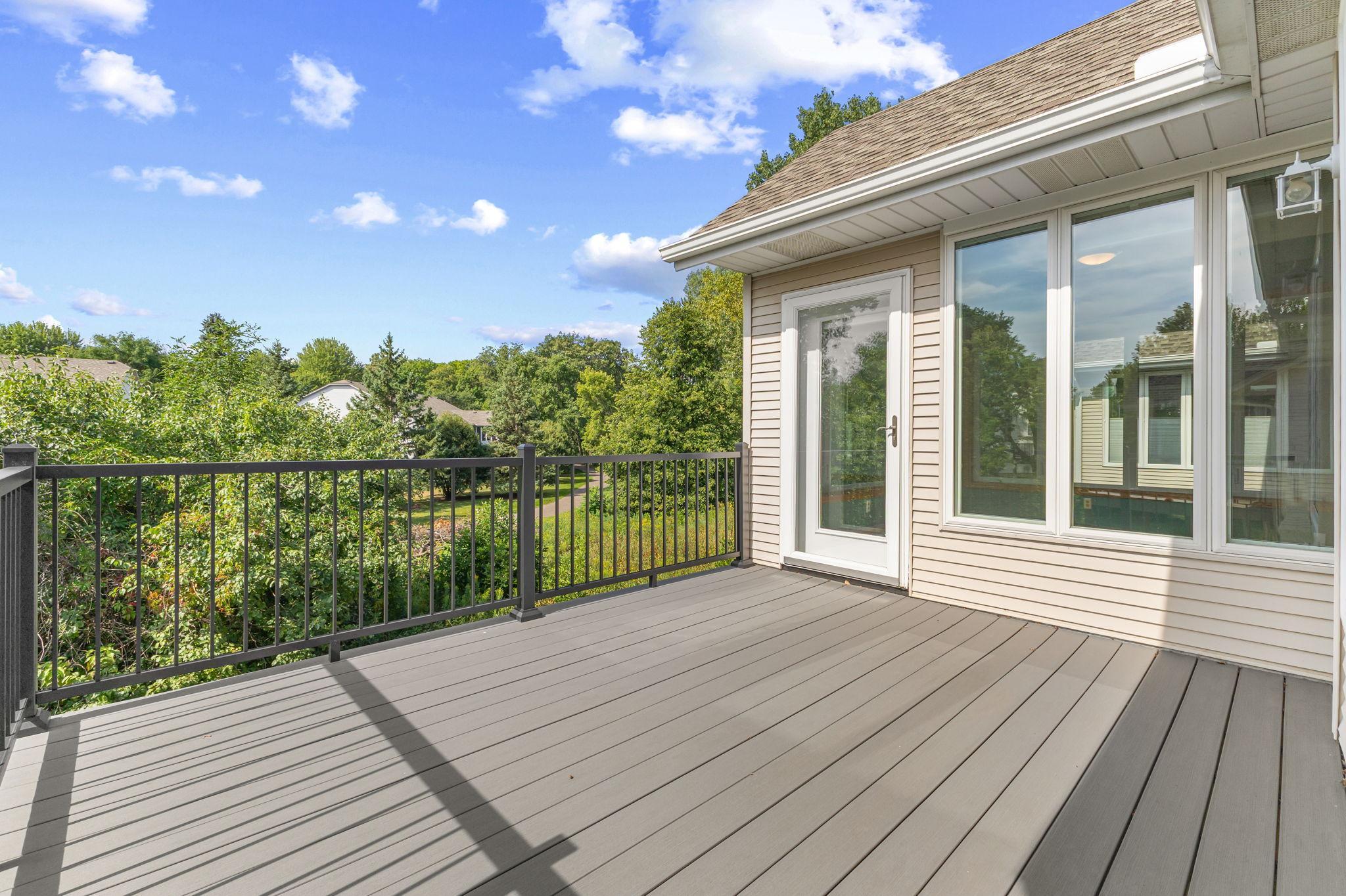 Enjoy beautiful green views from the private deck.