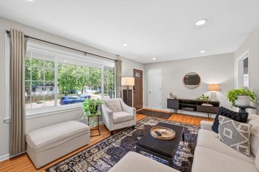 The large window really brings in the sunshine to the living room