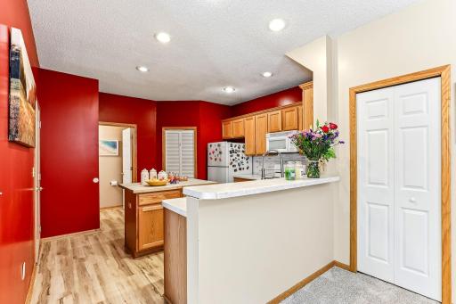 Kitchen with newer flooring, appliances