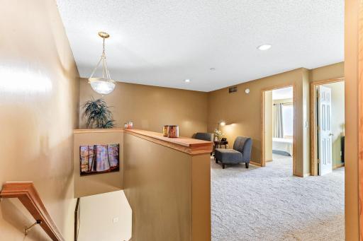 a versatile loft, perfect for a home office, entertainment area, or additional living space