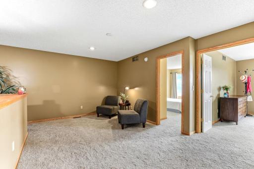 a versatile loft, perfect for a home office, entertainment area, or additional living space