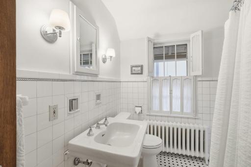 Clean efficient 2nd upstairs bathroom with circular access from Bedroom 4 and 2nd floor landing.