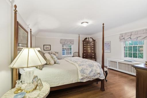Large primary bedroom with attached changing room walk-in closet!