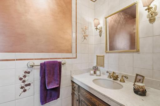 Parisan-inspired Powder Room with gorgeous original details