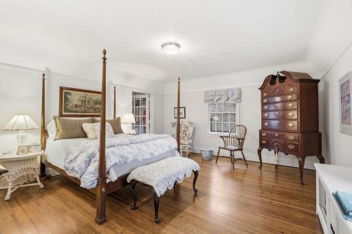Large primary bedroom with attached changing room walk-in closet!