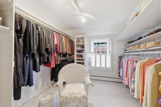 Large Changing Room Walk-In Closet with window and abundant natural light!