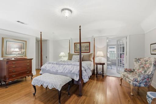 Large primary bedroom with attached changing room walk-in closet!