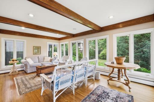 Large Sunroom off the back overlooking the porch and back yard.