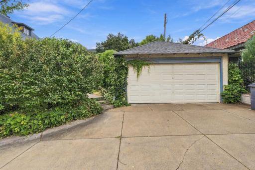 2 Car Garage with larger pad for turning and exiting driveway.