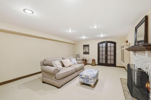 Large Finished Basement Living Room, Game Room, Etc with wood burning cozy fireplace.