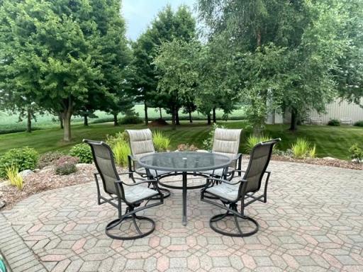 Paver Patio off dinette with enjoyment of treed line parcel