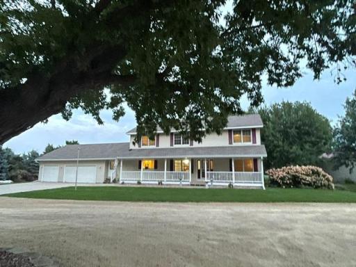 Enjoy watching the sunset from the 48' X 6' porch, space for multiple seating