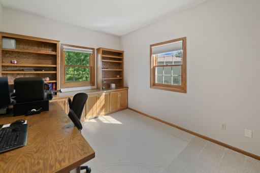Office space with open wall for additional uses