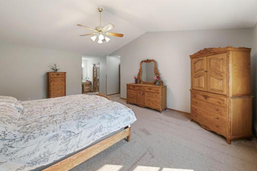Spacious primary bedroom affords generous sized furniture