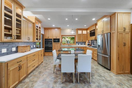 High end stainless steel appliances, bottom mount refrigerator, double oven, dishwasher