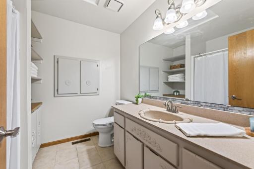 The upper level 3/4 bathroom features a brand new shower