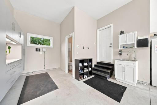 3+ Garage w/In-Floor Heating/ 1/2 Bathroom (5) - Main Level - Garage Workshop