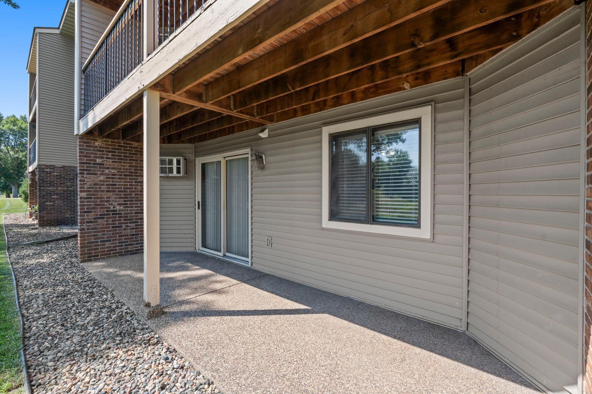 The spacious private patio accessible from the living room.
