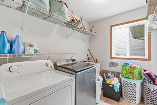 Drop your clothes off on the way out to the garage. Even has a sink!