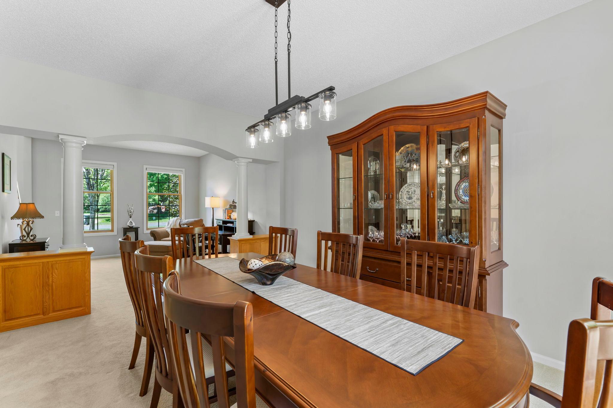 A different perspective of the formal dining room, showcasing views into the front sitting room.