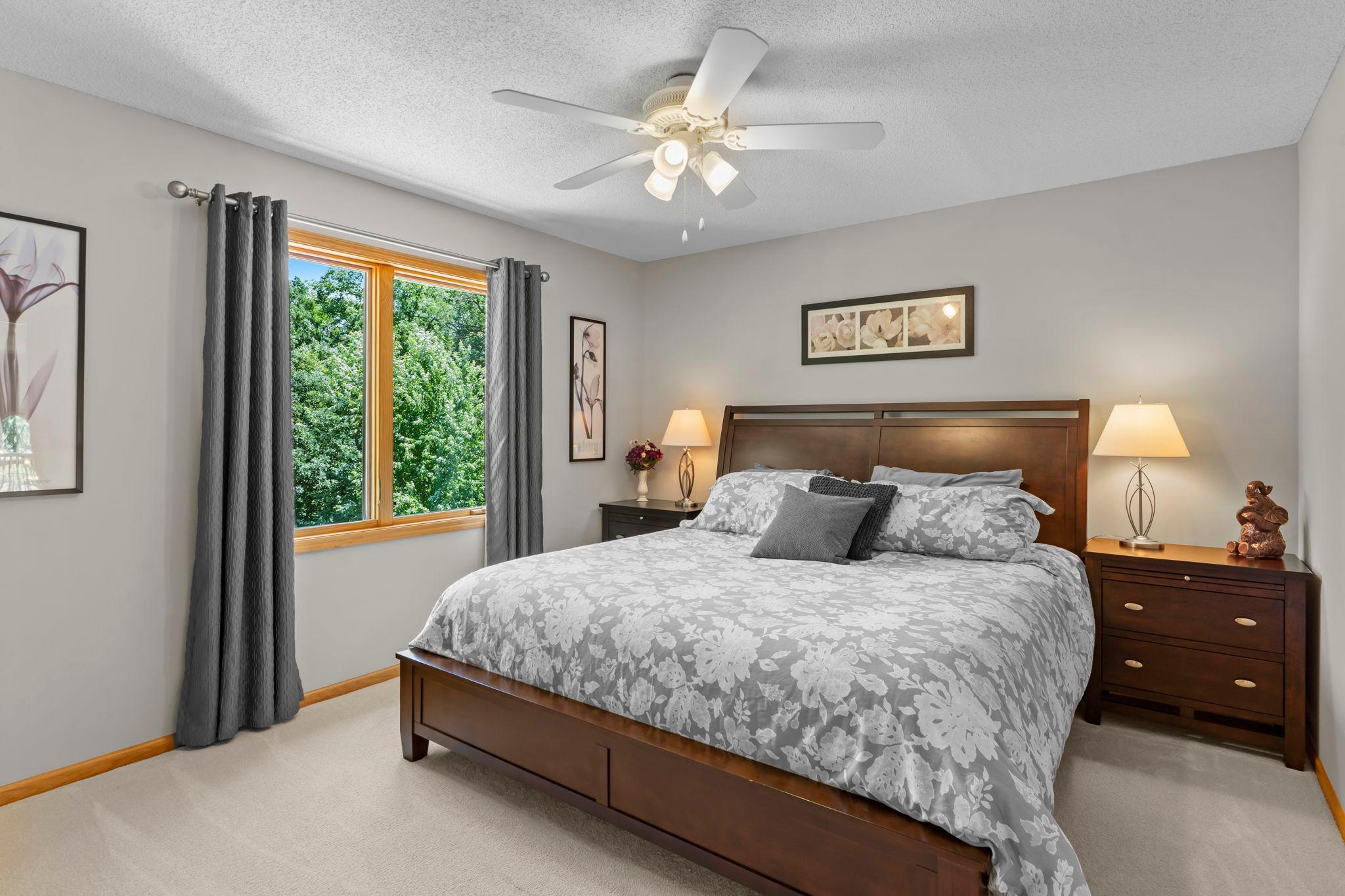 Bedroom three features new carpeting, a walk-in closet, and a shared Jack-and-Jill bathroom with bedroom four.