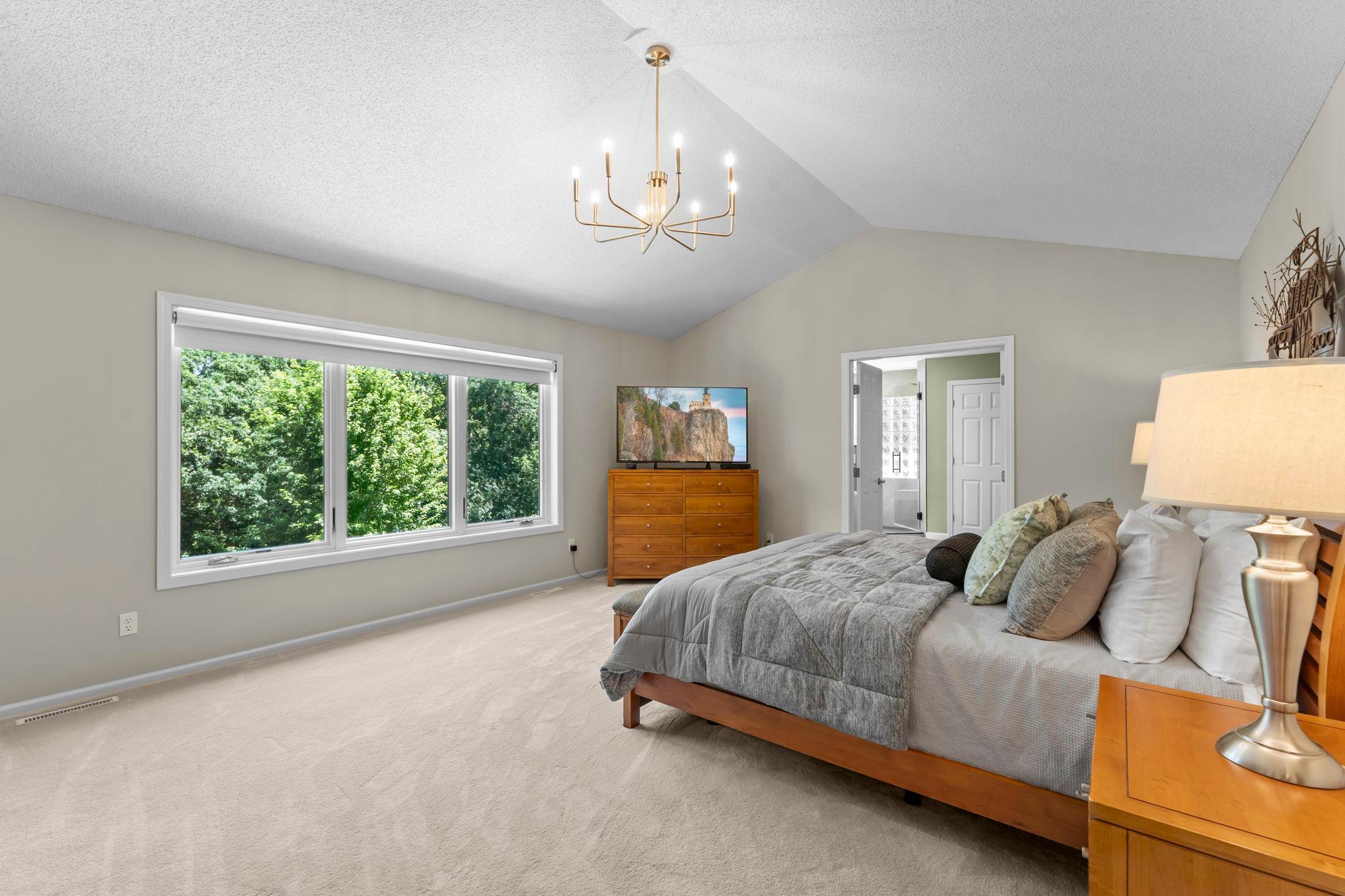 Upstairs, you’ll find four bedrooms conveniently located on one level, including an impressive primary suite.