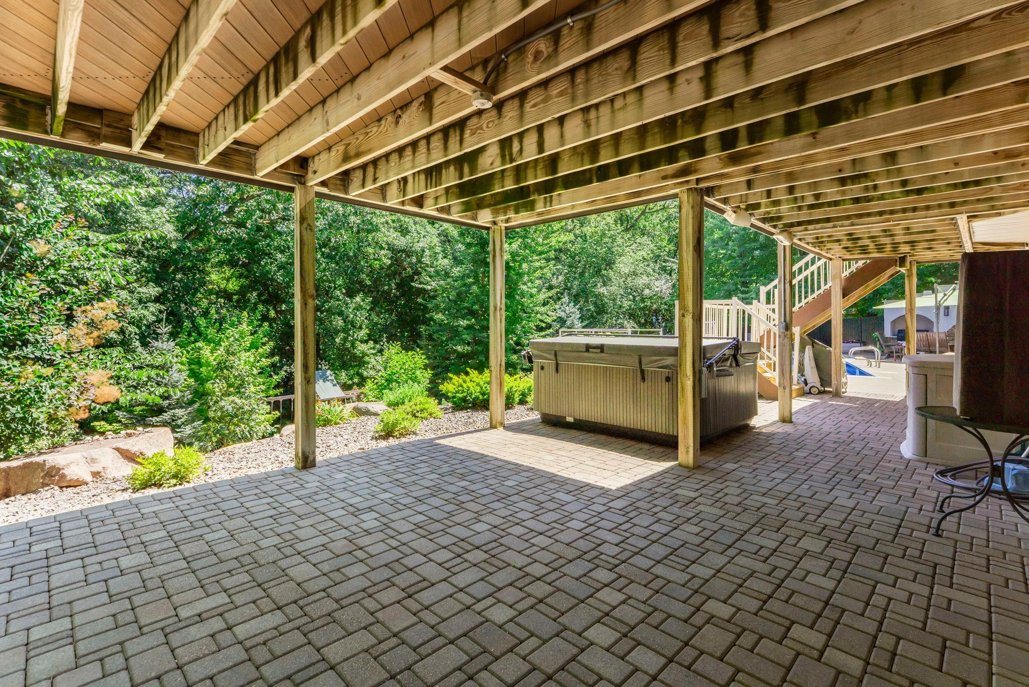 The large patio and hot tub area.