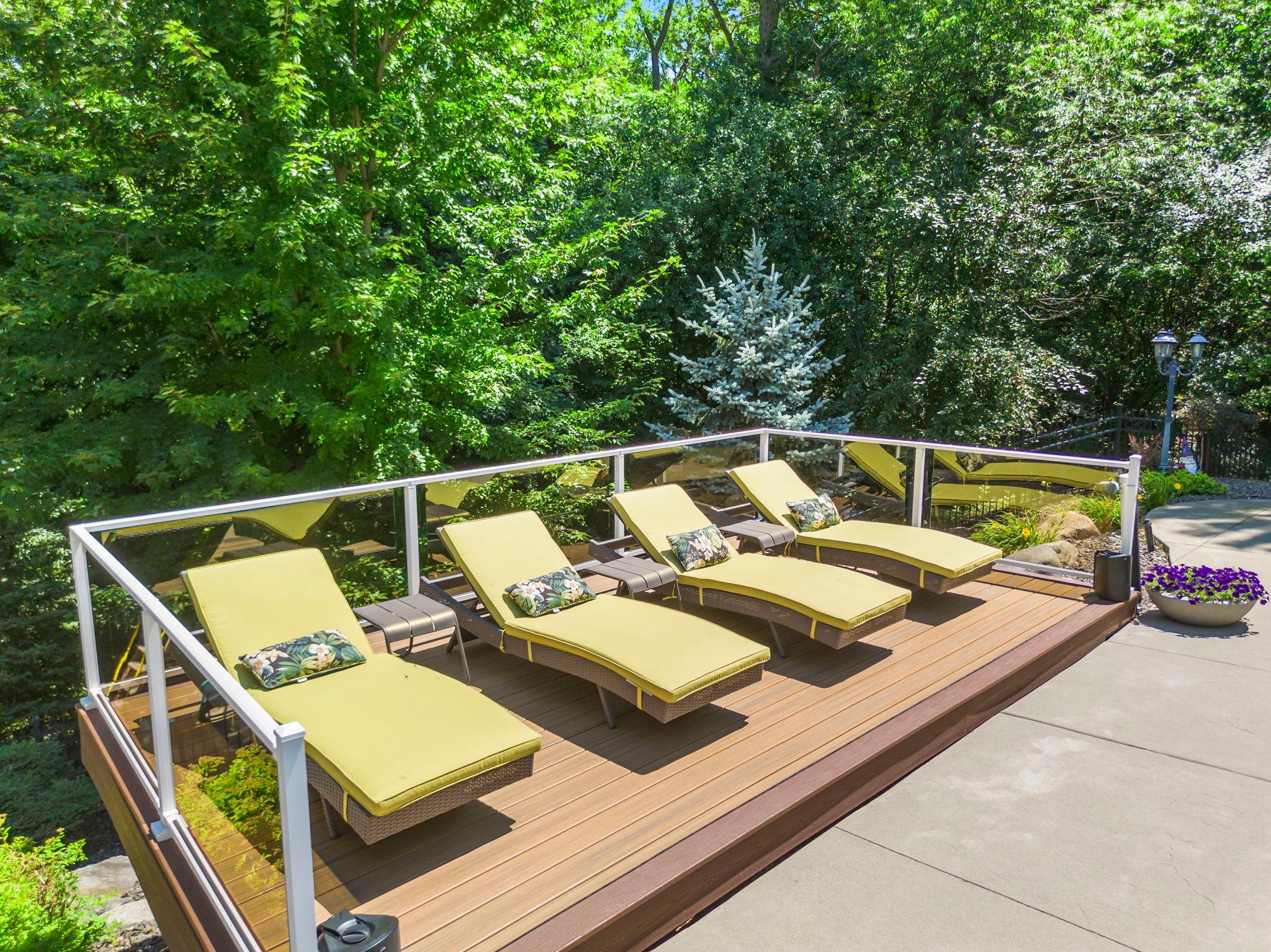 The raised secondary deck poolside, perfect for soaking up the sun.