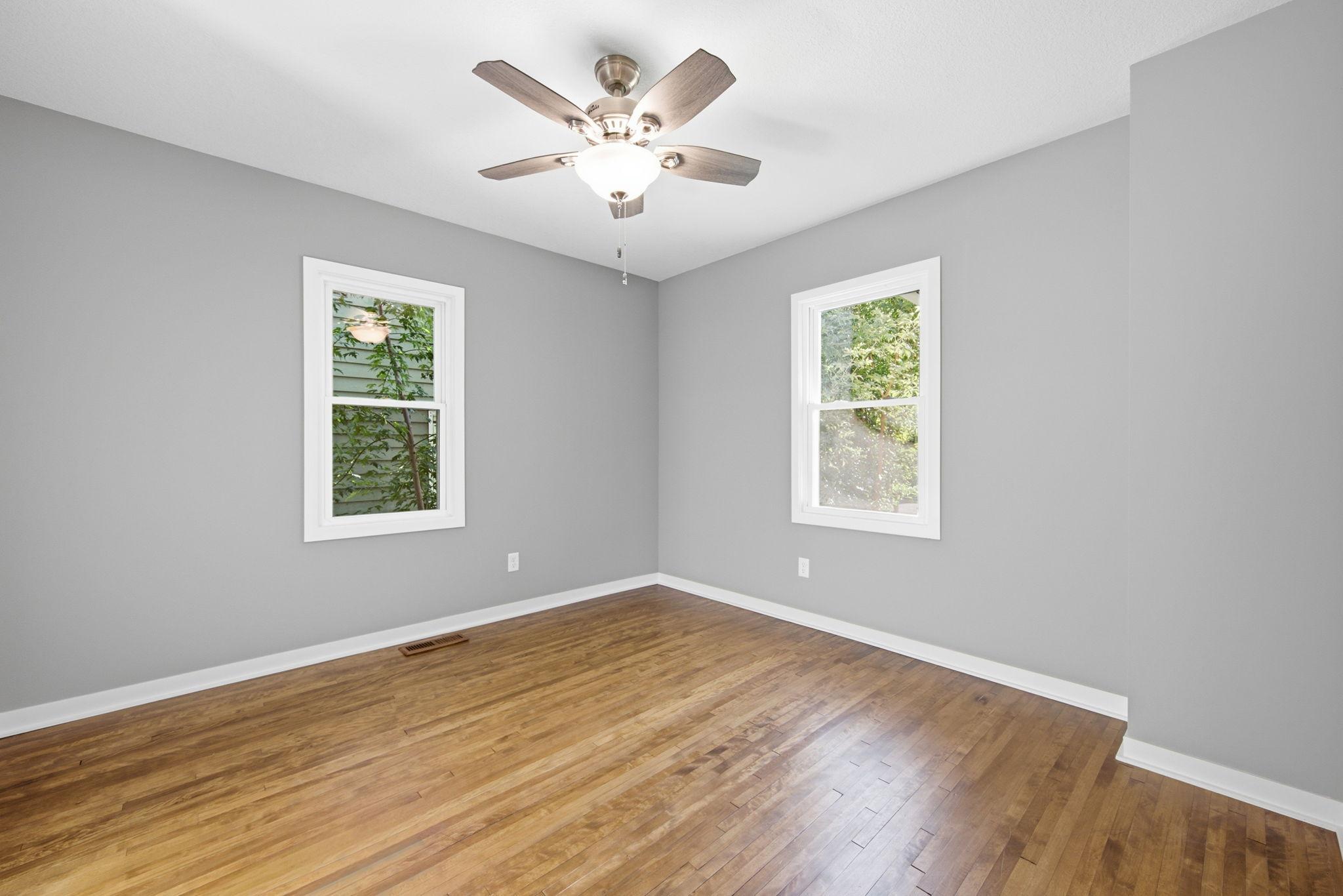 Main floor primary bedroom offers a walkin closet and ensuite bathroom