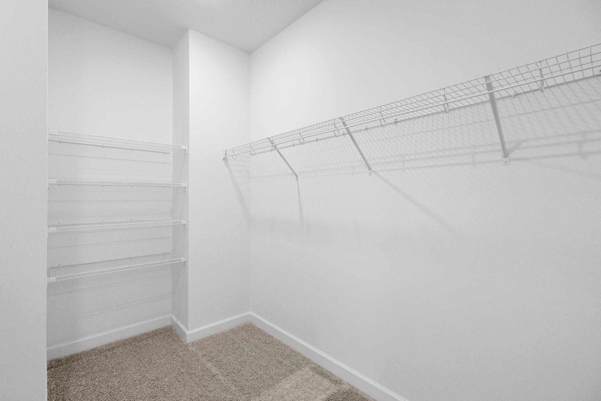 Built-in ventilated shelving helps maximize wardrobe, shoe and linen storage