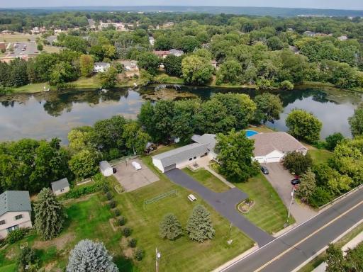 Aerial view of the home, 1.4 acre lot and lake!