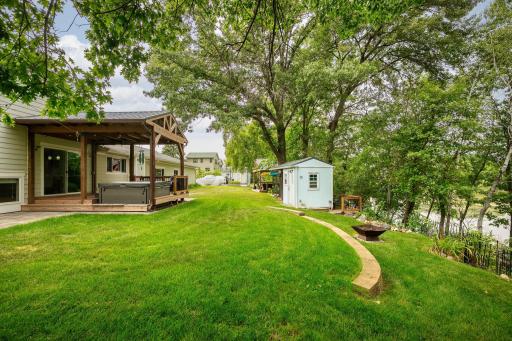 There is a small shed/storage, another large storage shed, gated area, two gazebos, and bonfire area to enjoy in the backyard.