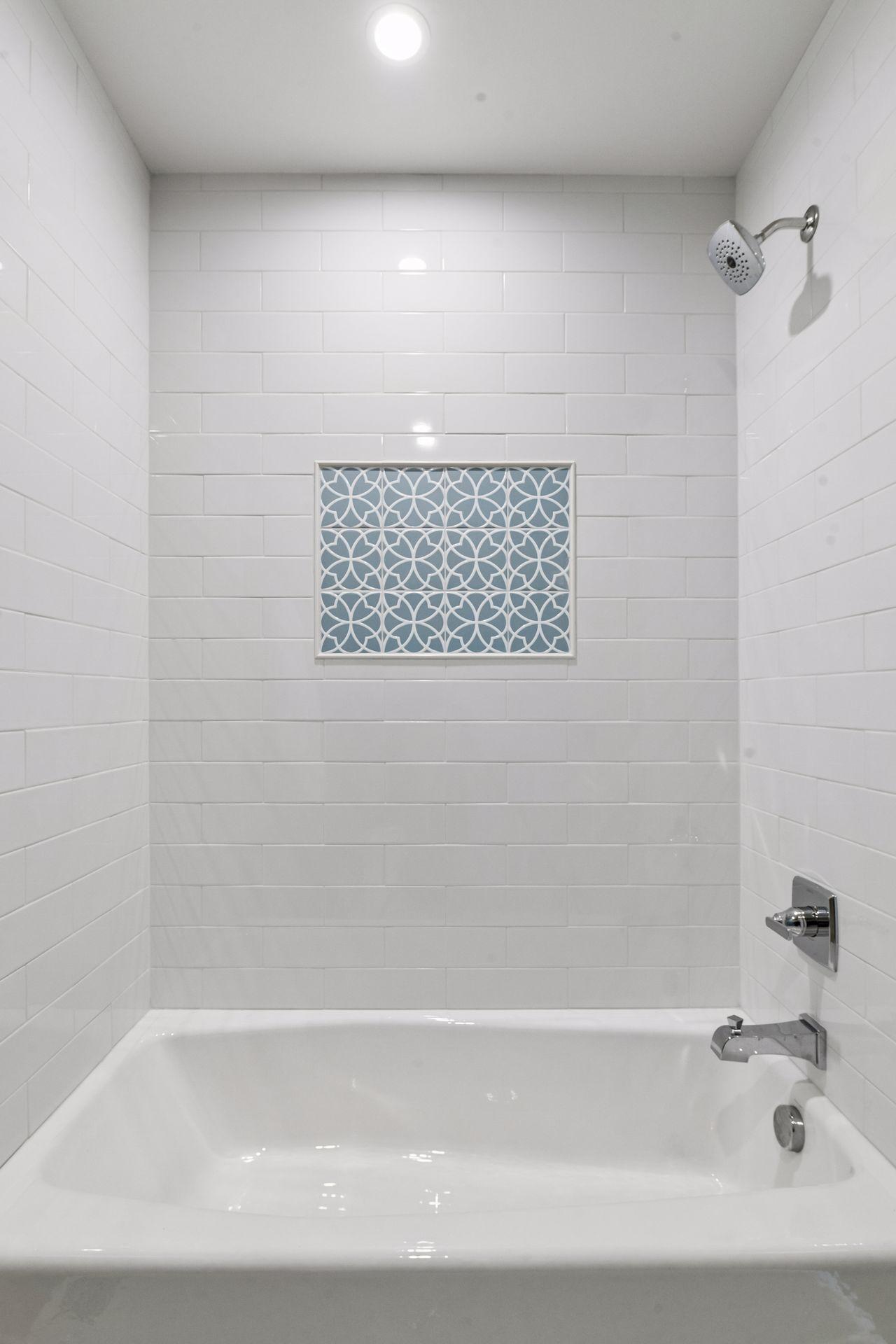 Full tub and shower combo in Jack and Jill Bath