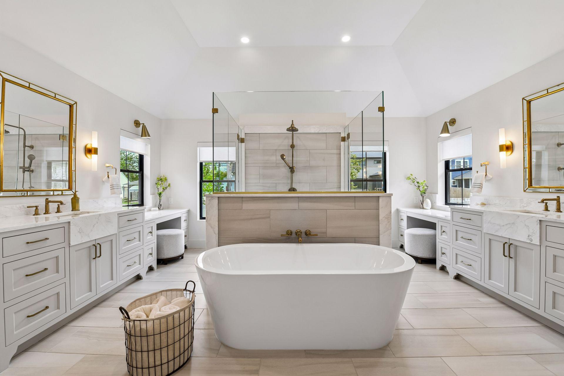 Primary bathroom retreat features in floor heat, free standing soaking tub and walk through tiled shower