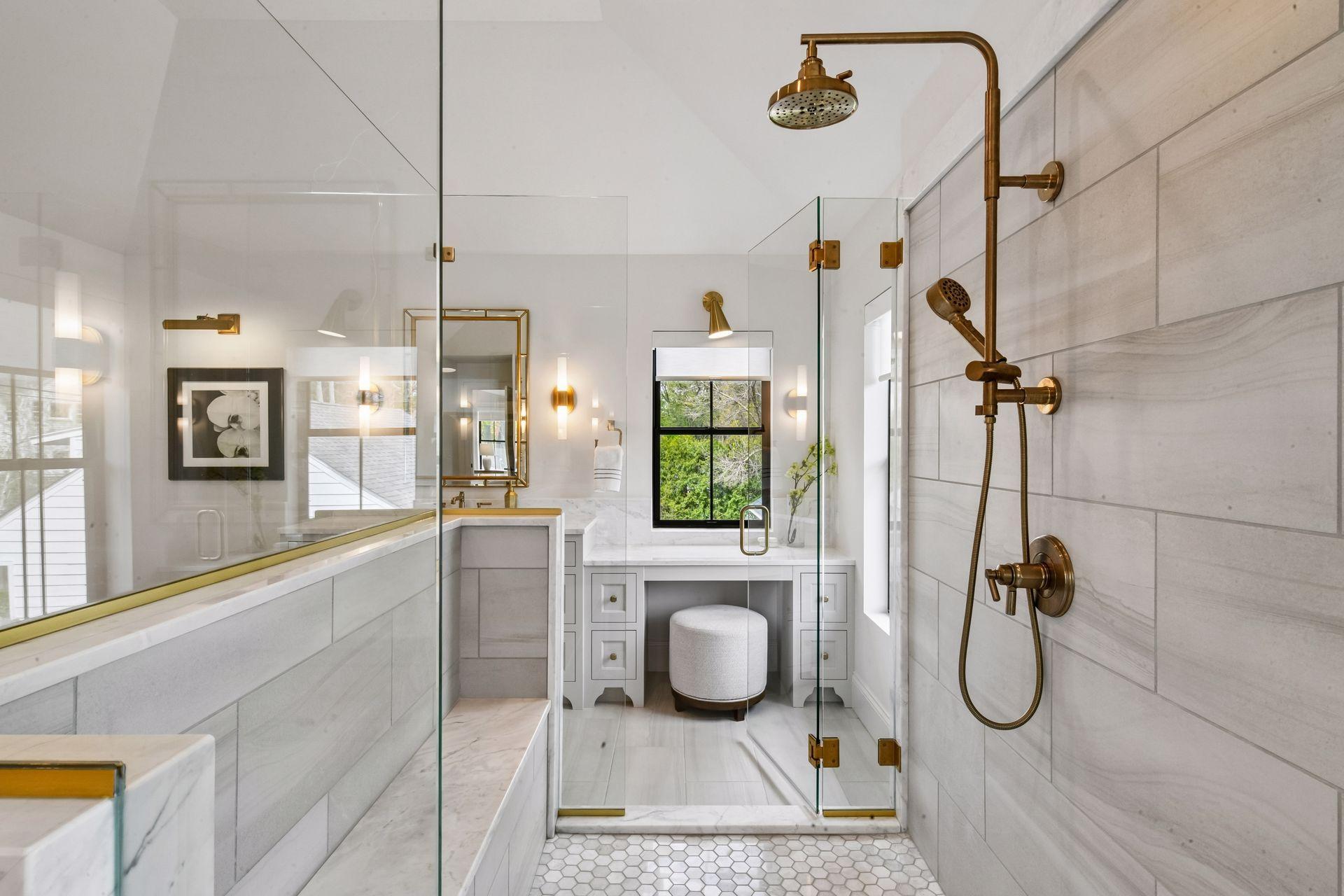 Primary bathroom retreat features in floor heat, free standing soaking tub and walk through tiled shower