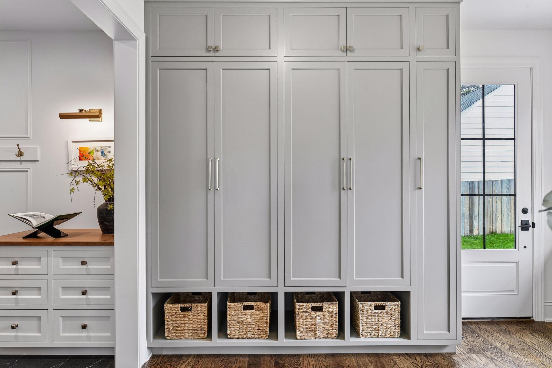 Floor to ceiling built in lockers off the mudroom to keep everything organized