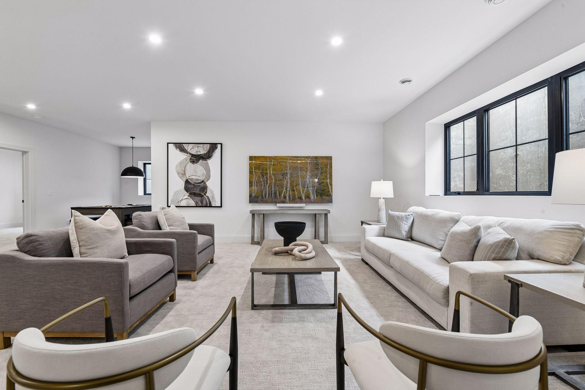Lower level is built for entertainment. Featuring large family room space, custom built in bar and game nook.