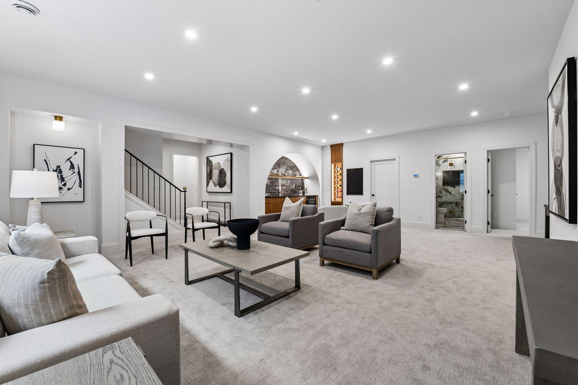 Lower level is built for entertainment. Featuring large family room space, custom built in bar and game nook.