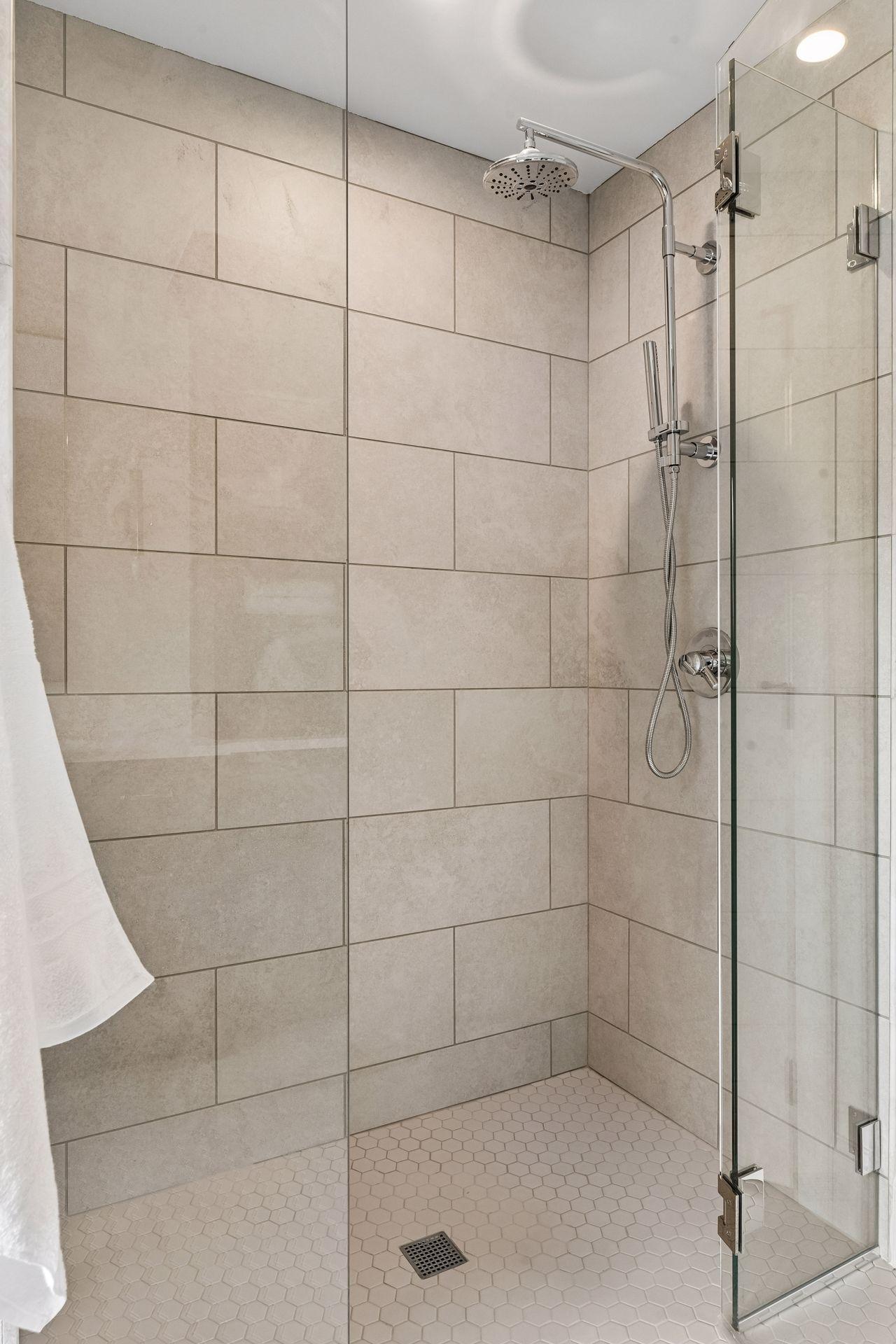 Junior Ensuite features glass paneled walk in shower