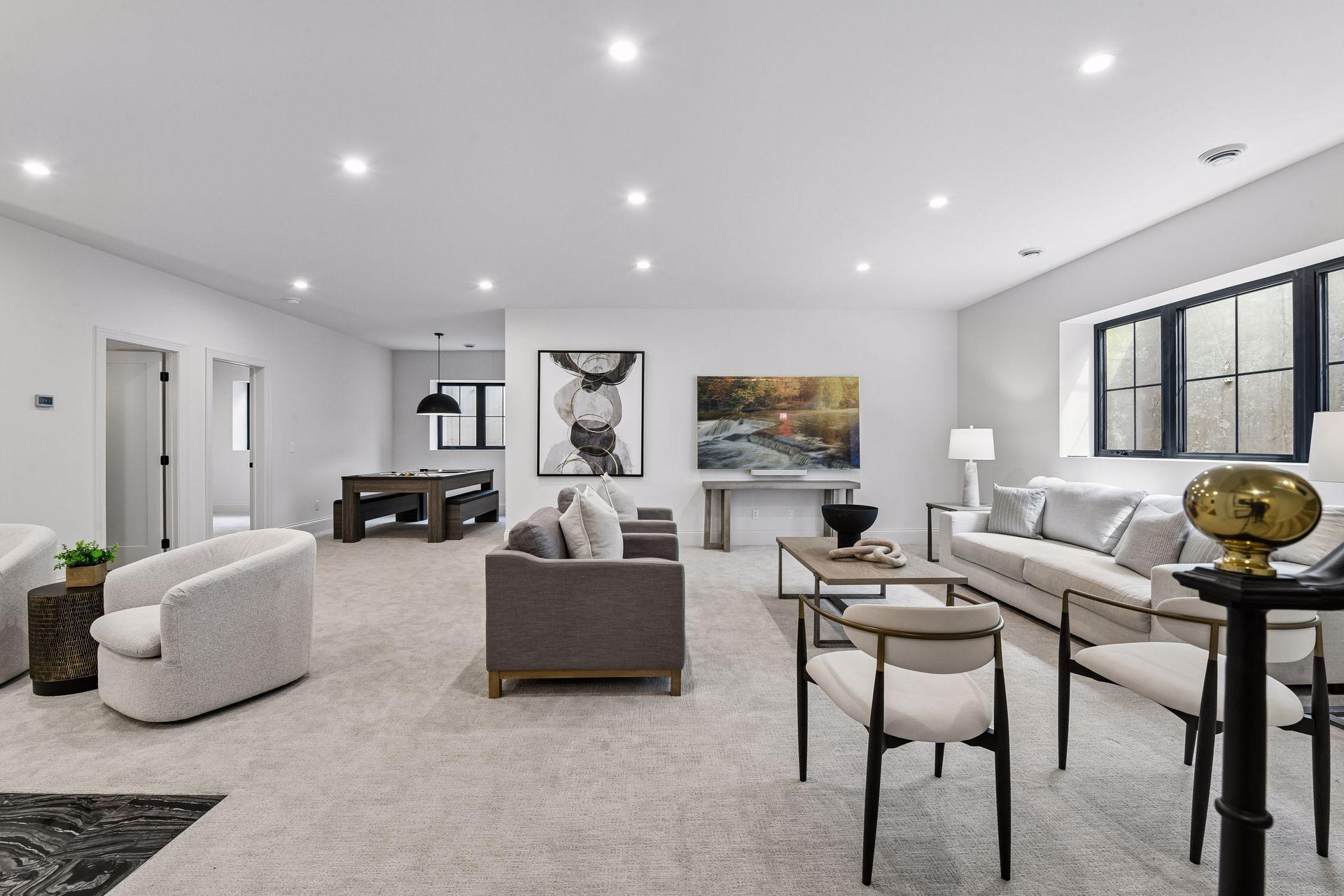 Lower level is built for entertainment. Featuring large family room space, custom built in bar and game nook.