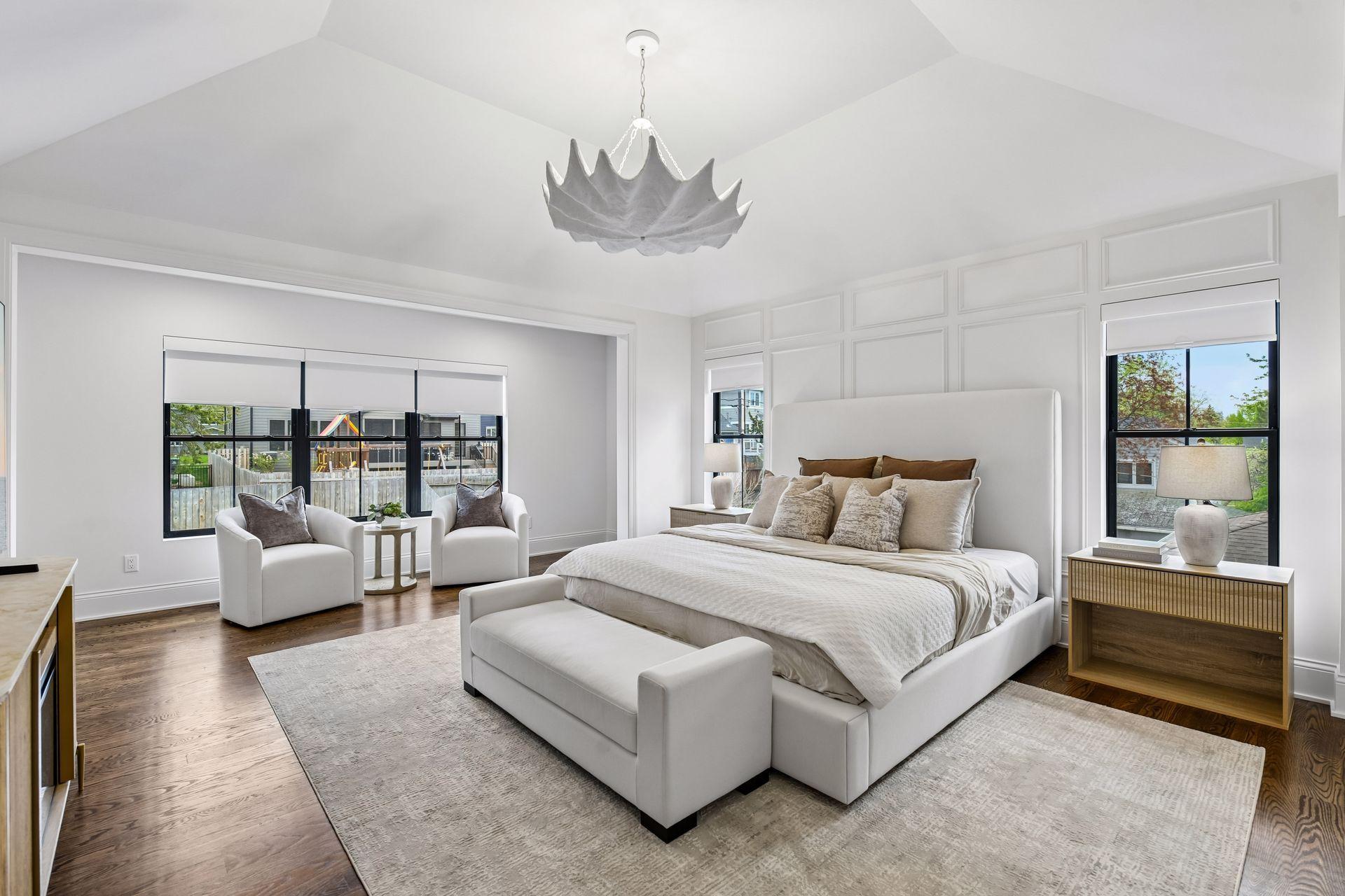 Upper level primary bedroom is its own private retreat