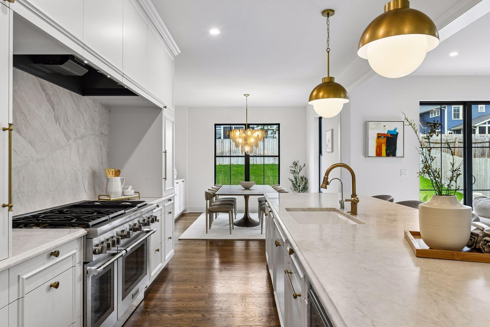 Chef's Kitchen includes Taj Mahal Quartzite, 48 inch Thermador range and paneled appliances