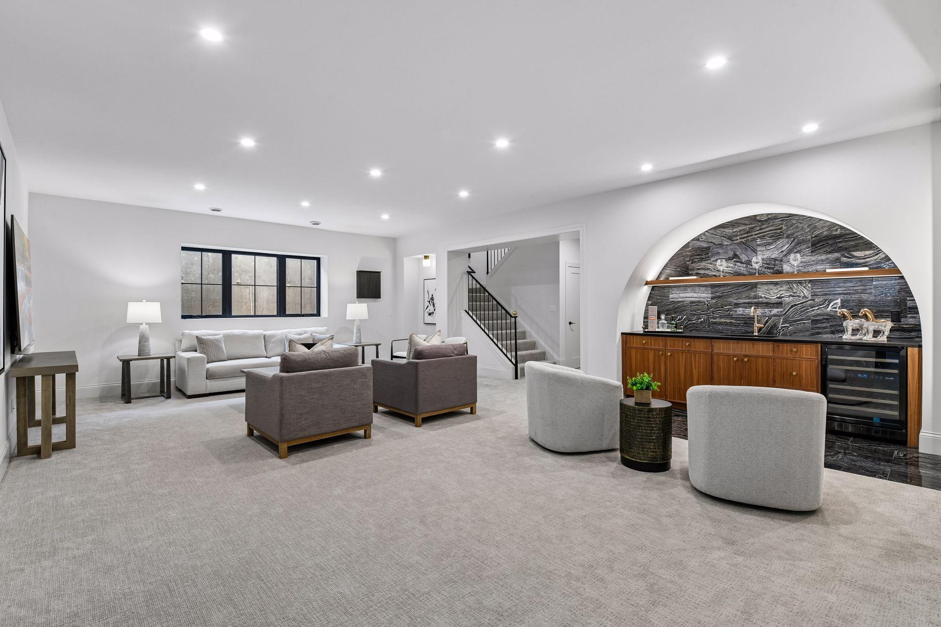 Lower level is built for entertainment. Featuring large family room space, custom built in bar and game nook.
