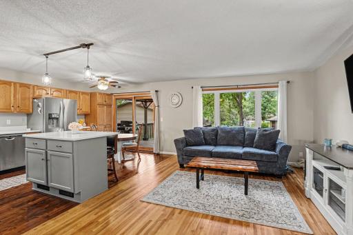 Large windows overlook the back yard