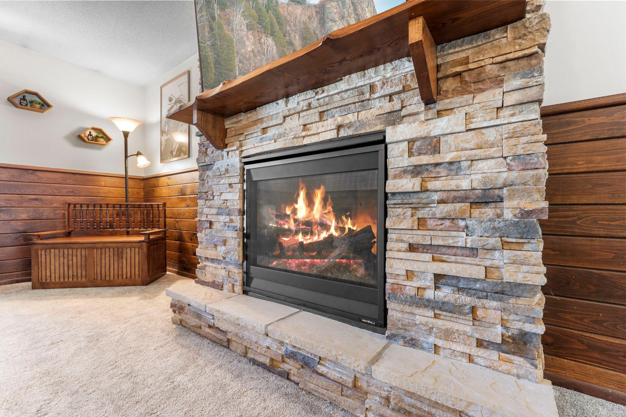 New Gas Fireplace and Stonework with Custom Live Edge Mantle