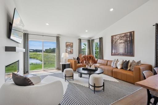 (Photo of a model home, finishes will vary) Airy and inviting, the Great Room is ideal for watching movies with the family and hosting special celebrations with guests.