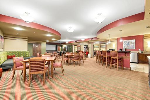 The Pub. Gather with friends, play some card games, or even join a seat yoga class! A casual informal Happy Hour is held every Friday from 4-6 pm.