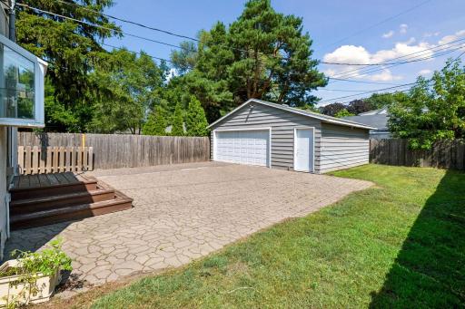 Outside, enjoy the backyard patio and two-car detached garage.
