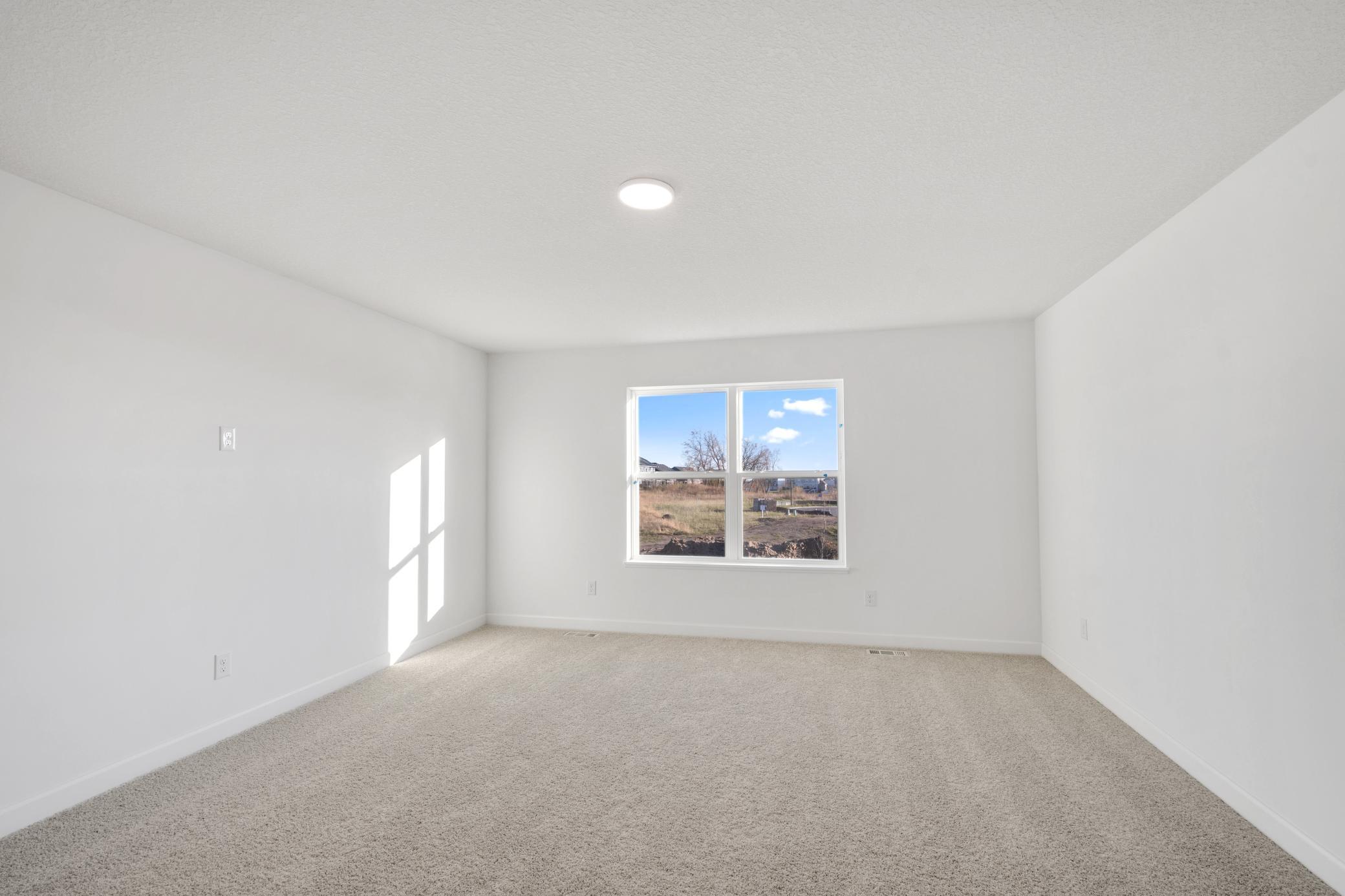 (Photo of a similar home, actual finishes may vary)