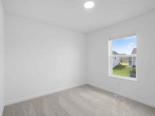The secondary bedrooms offer comfort and privacy.